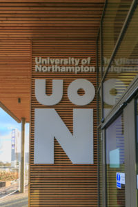 Photo of the UON logo on Senate building