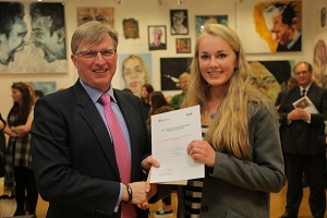 Alastair Gough presents Miranda May with her prize