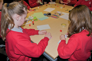 Girls taking part in a science workshop