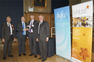 University representatives collecting the Hefce award