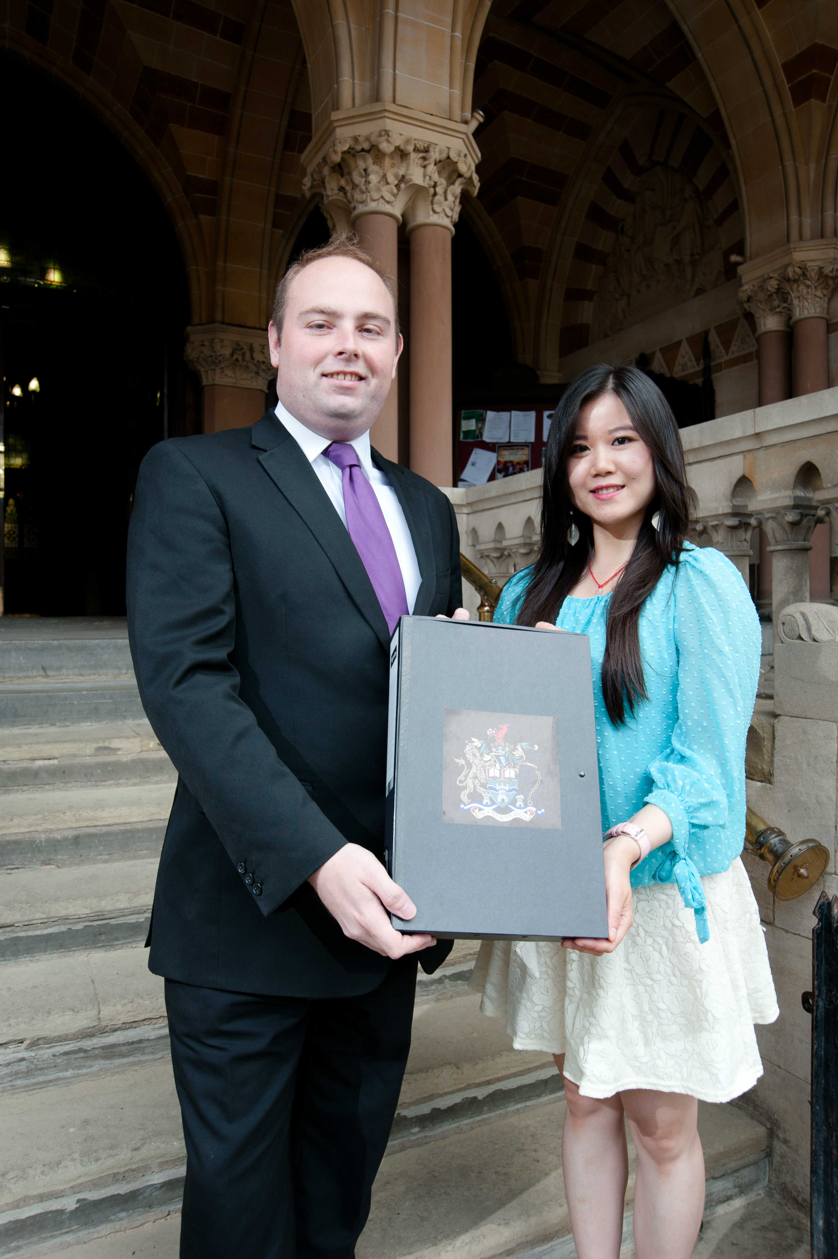 Haviour Chen, President of SU and Councillor David Mackintosh with approved Waterside plans