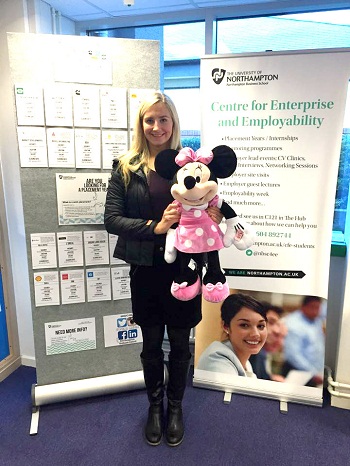 NBS student with Minnie Mouse cuddly toy