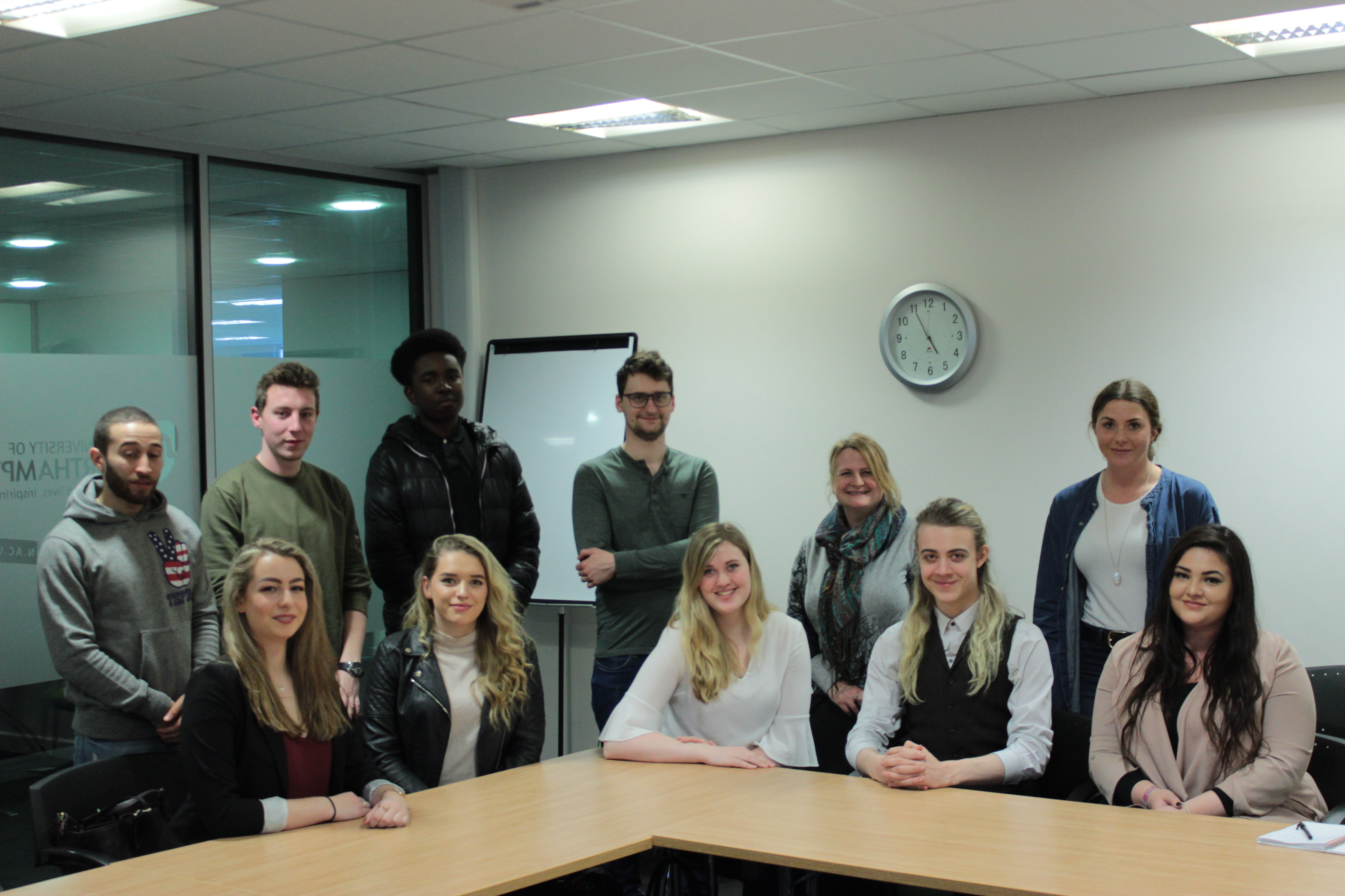 Charity student group around a table