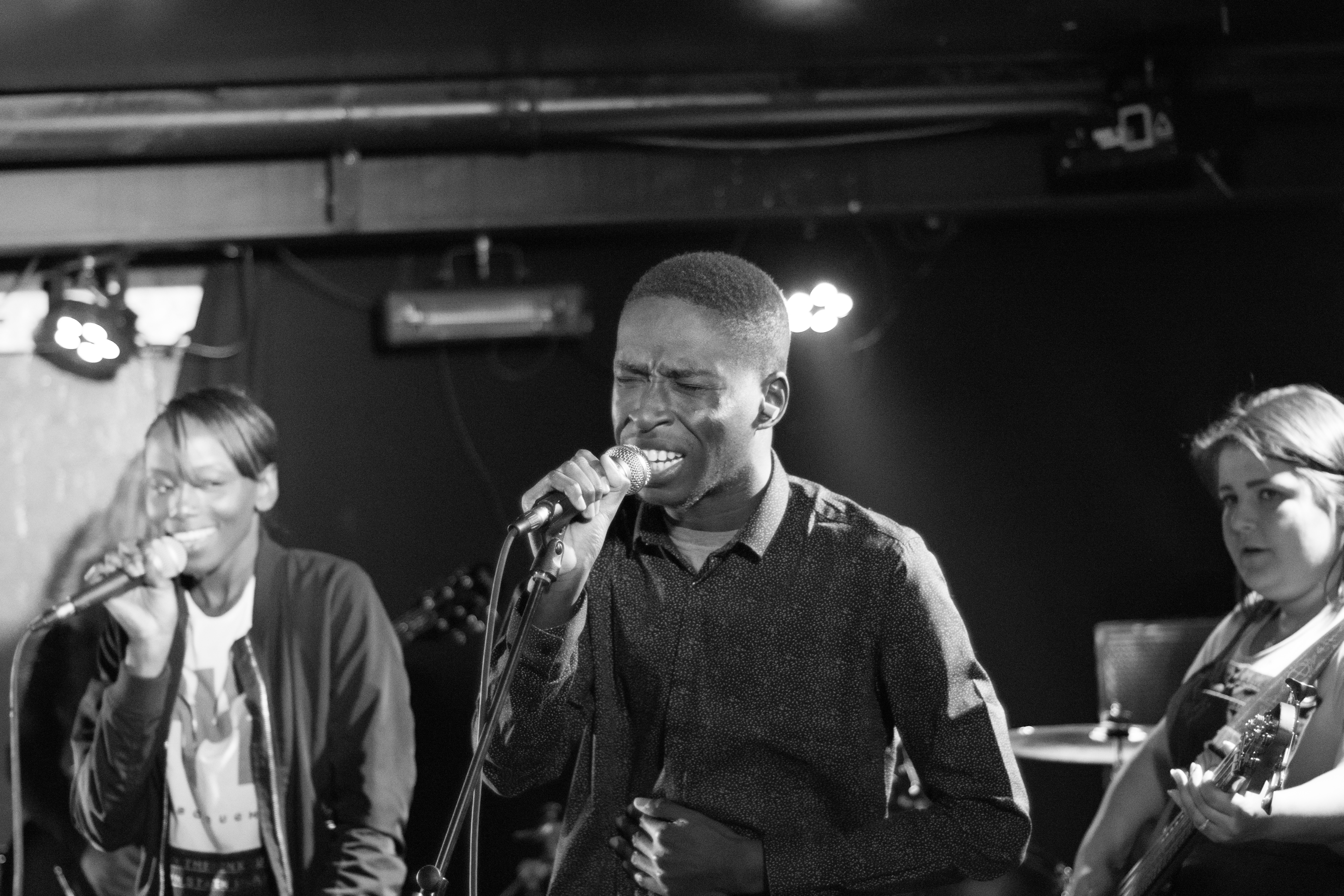 Three second years preforming, two singing and one on strings