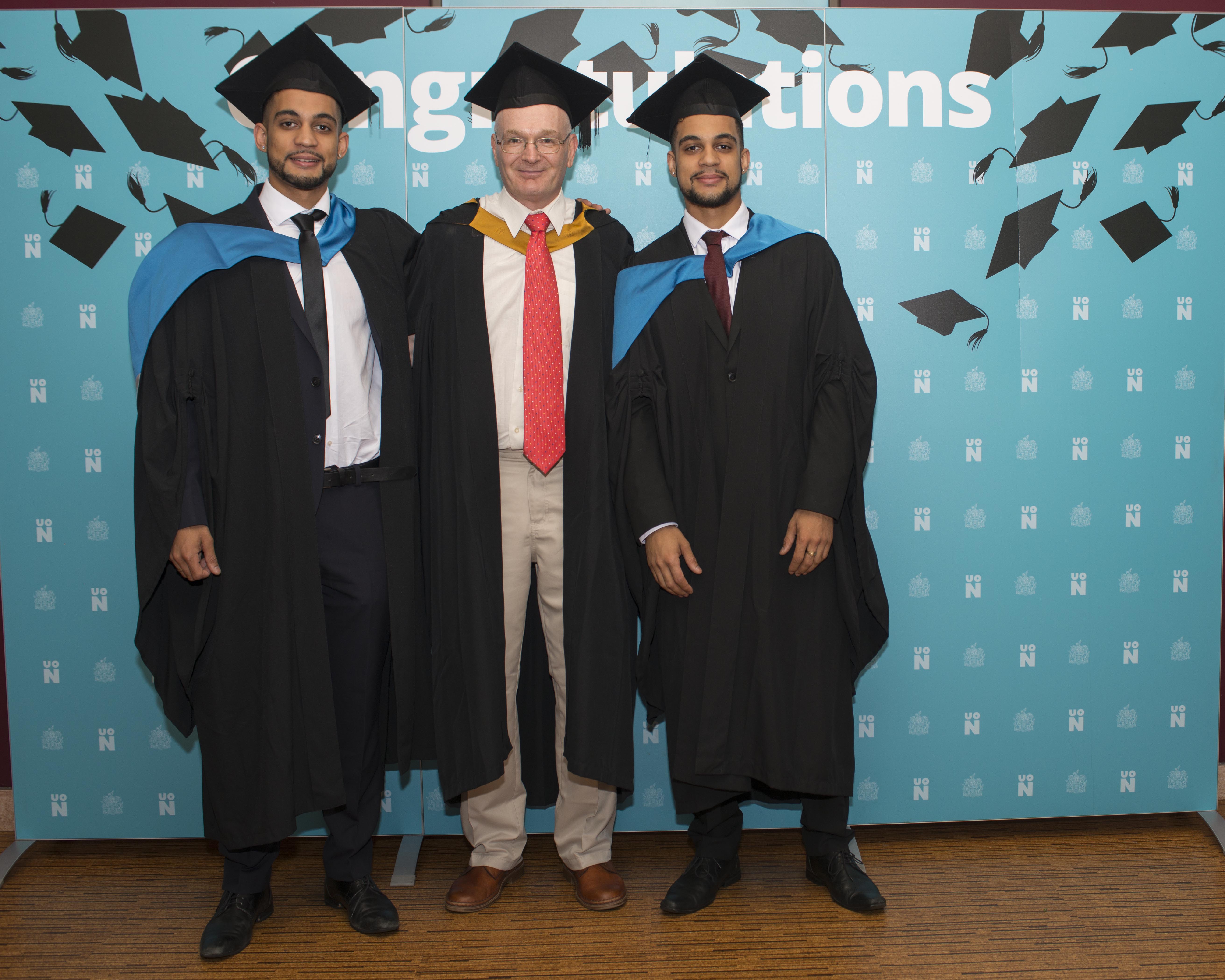 Twins - graduation with tutor