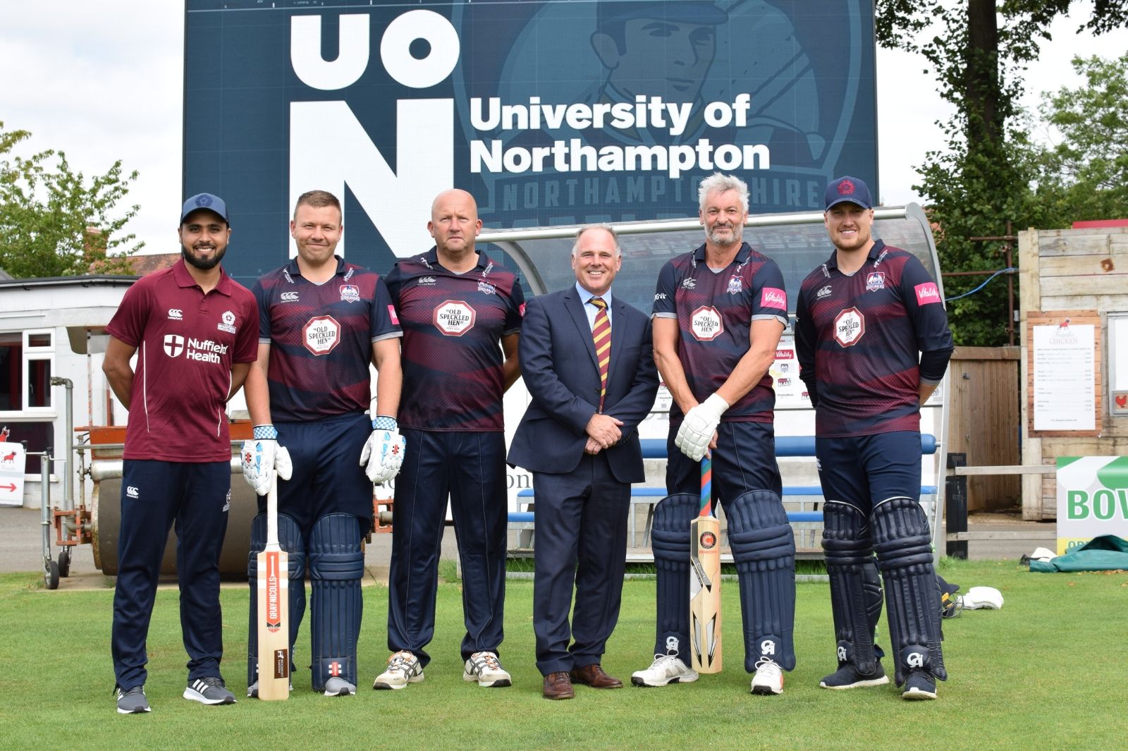 Photo of Nick Petford with members of Northamptonshire County Cricket Club