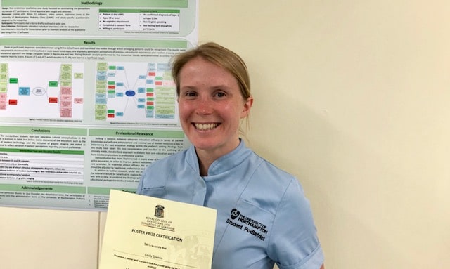 Podiatry student Emily Spence holds a certificate for the Podiatric Medicine Clinical Research Award in front of her academic poster