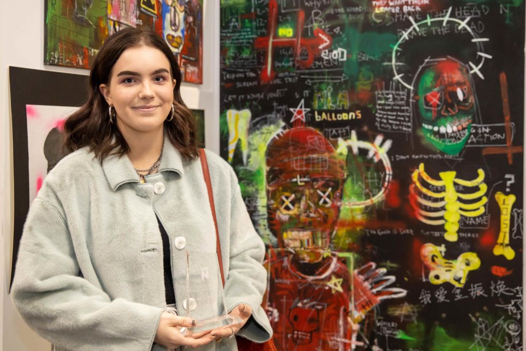 Mia Woods with her winning artwork 'Hell Just Called'.