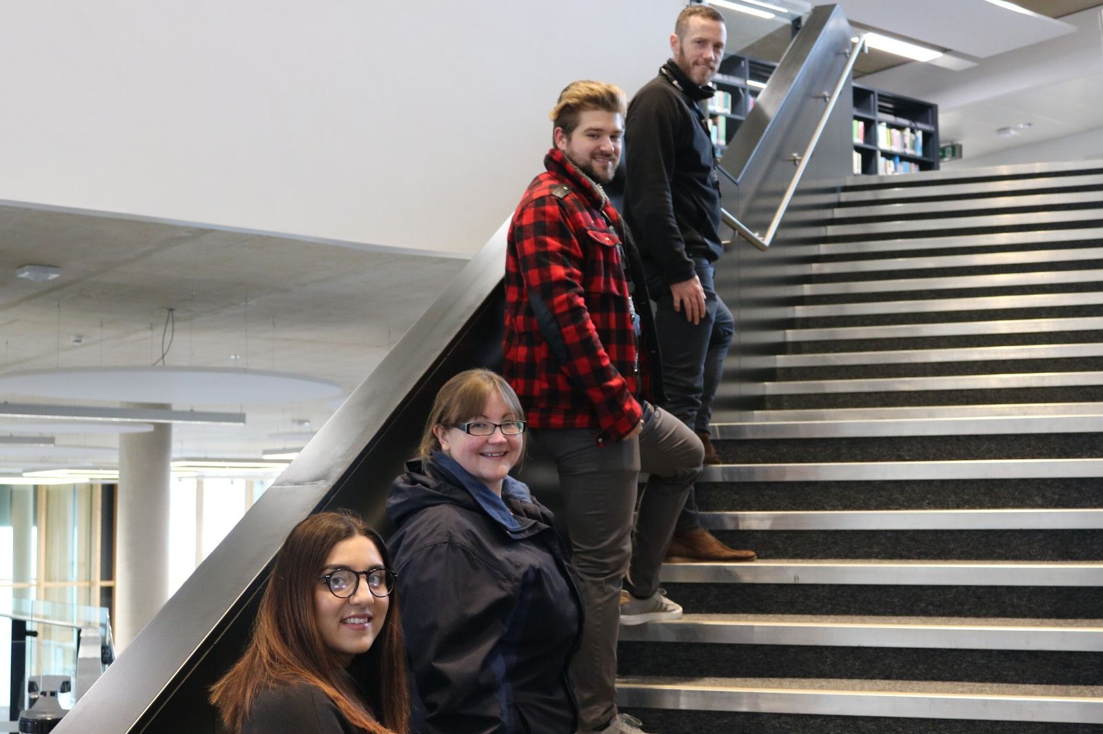 Photo showing staff on a staircase at the Learning Hub