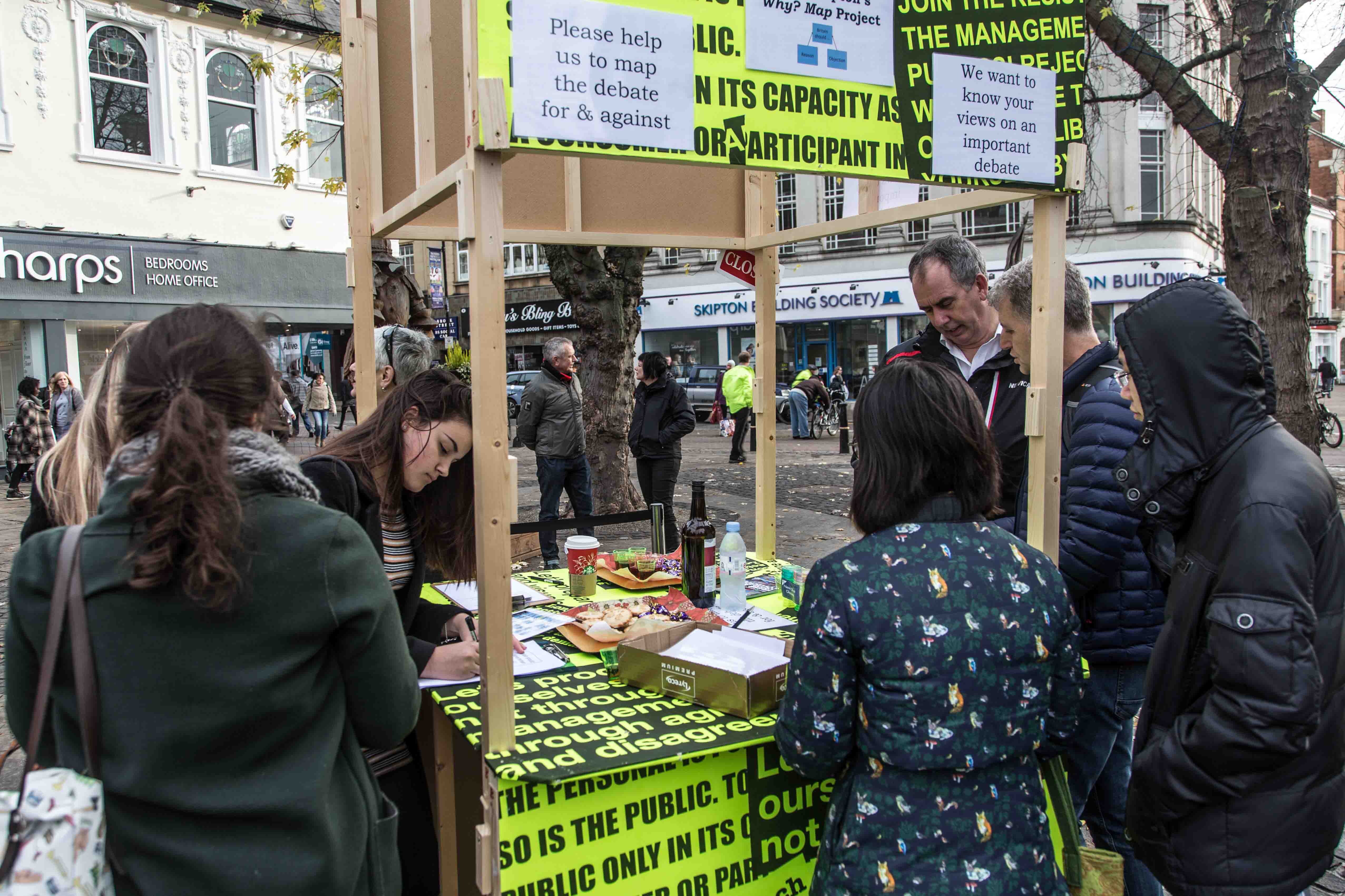 Pictured is the Freee-Carracci-Institute with the Brexit Research Group, Freee Kiosk #2 (open) with the Why?Map, Market Square, Northampton, in collaboration with NN Contemporary. Photographs taken in November 2016 by Joe Brown.