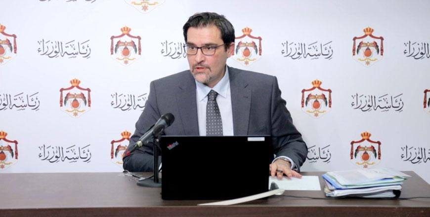 Khalid Saif pictured at a press conference when undertaking ministerial duties