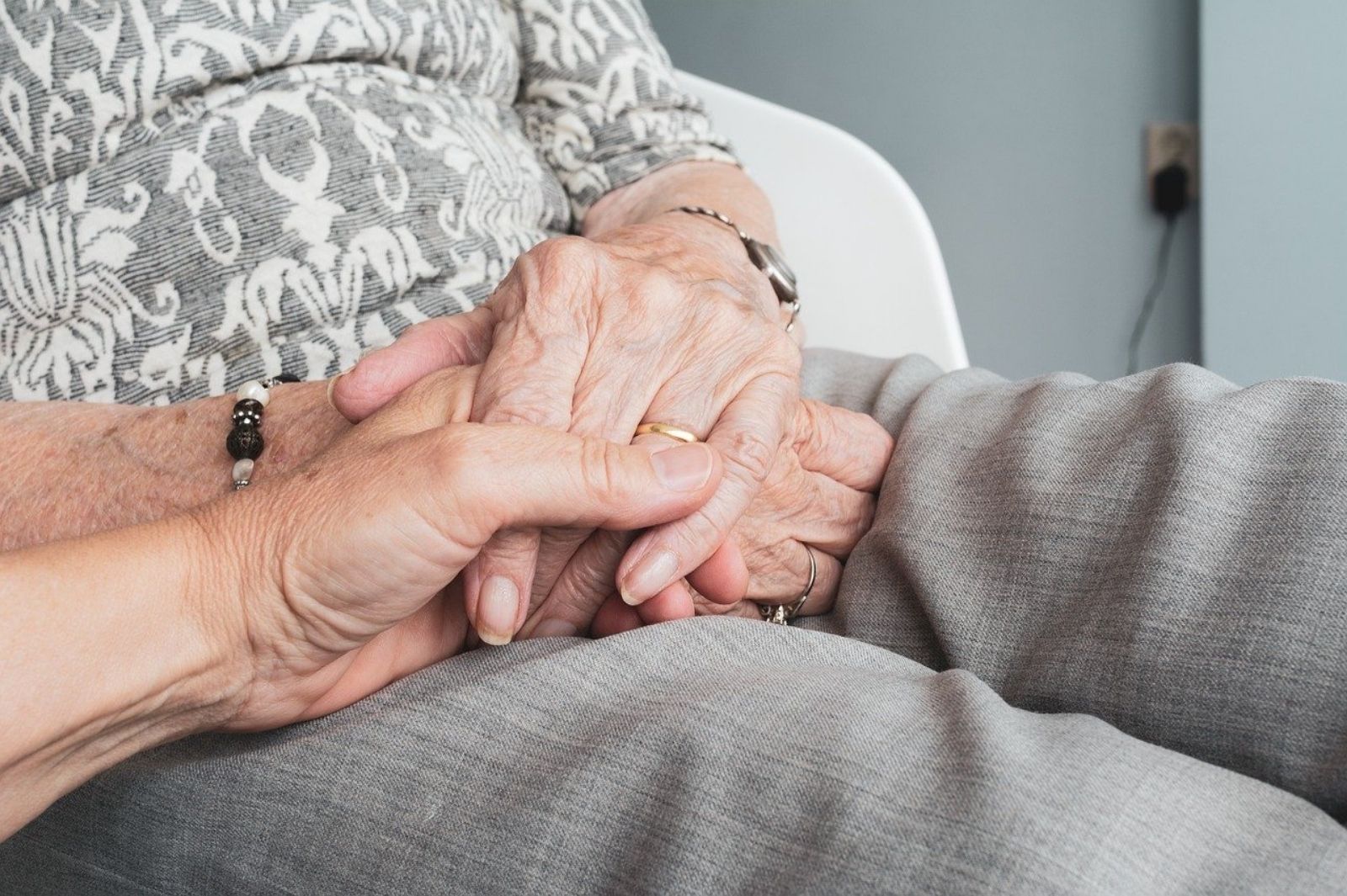 Older person hands held