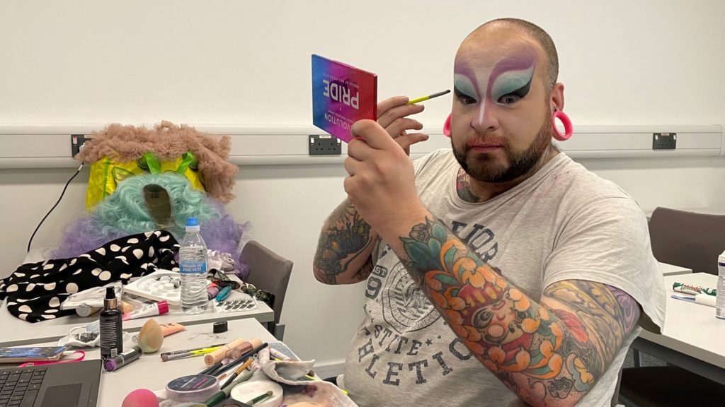 Phil Harper applying drag make-up