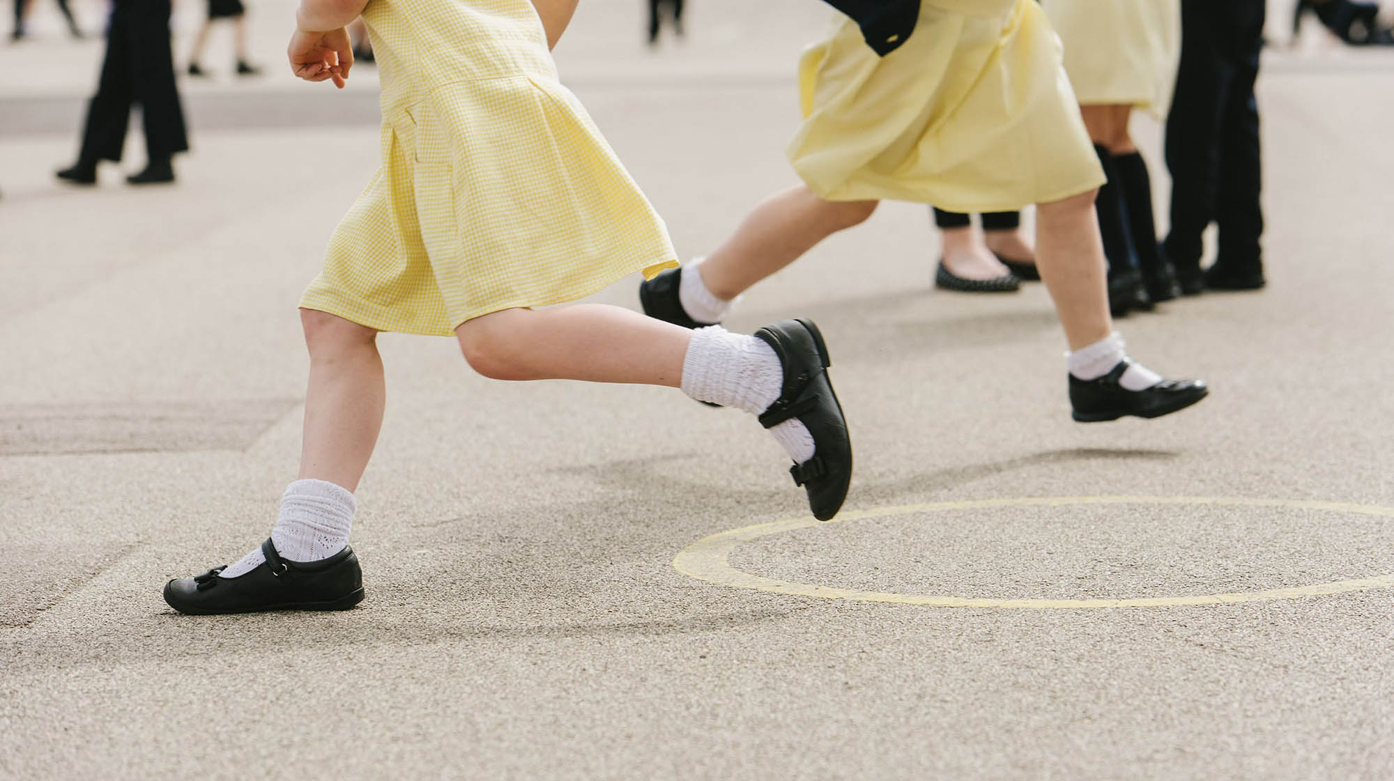 Children running in a playground