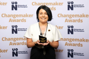Becky Bradshaw representing UON Estates and Campus Services, holding the Changemaker Special Recognition Award