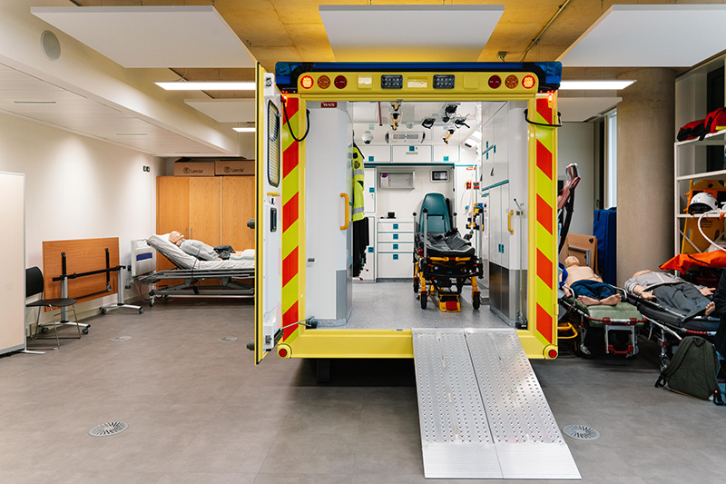 External shot of the Ambulance Simulator in the Clinical Skills Suite, showing the door open into the ambulance