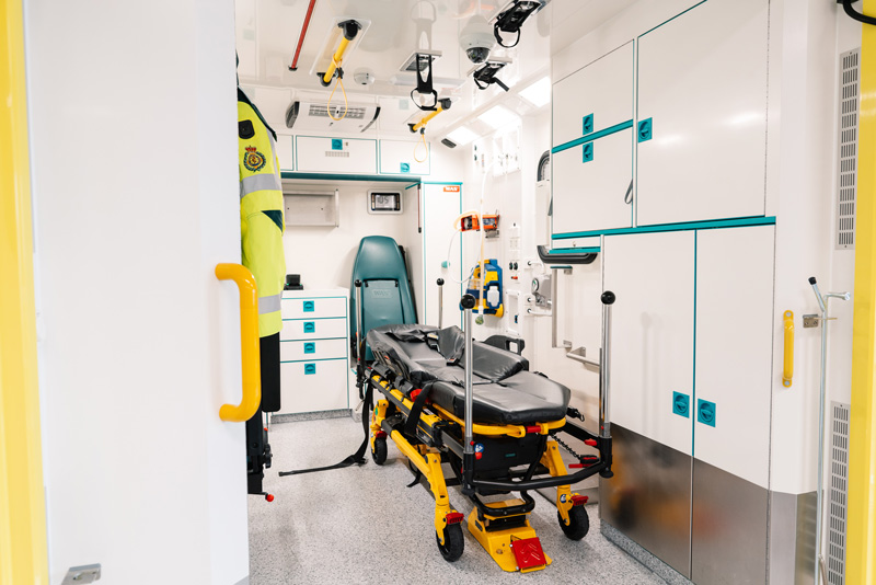 Internal view of Ambulance Simulator, showing cupboard and bed.