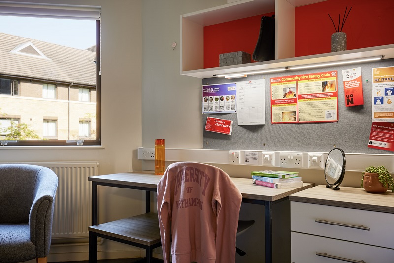 Desk and chair in single studio in Scholars Green Halls