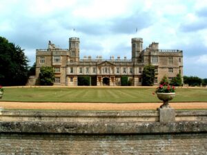 Photo of the Canons Ashby house, with green in front and a pathway.