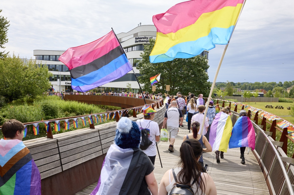 Pride flags waving in front of Creative Hub on Waterside Campus.