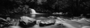 Black and white photo of a waterfall and rocks, taken by MA Fine Art student Shannen Garfitt