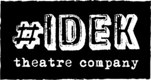 The logo for the IDEK Theatre Company. The logo shows the name of the company in black and white lettering on a black background