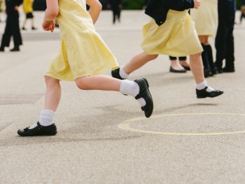 Children running in a school playground