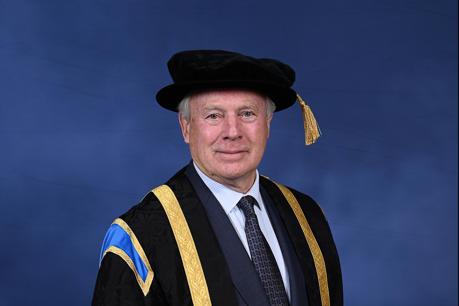 The University's Pro-Chancellor David Laing in a ceremonial gown and hat.