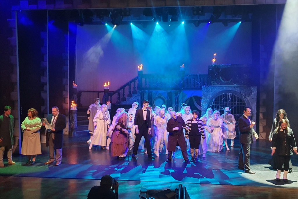 Group shot of actors on stage.