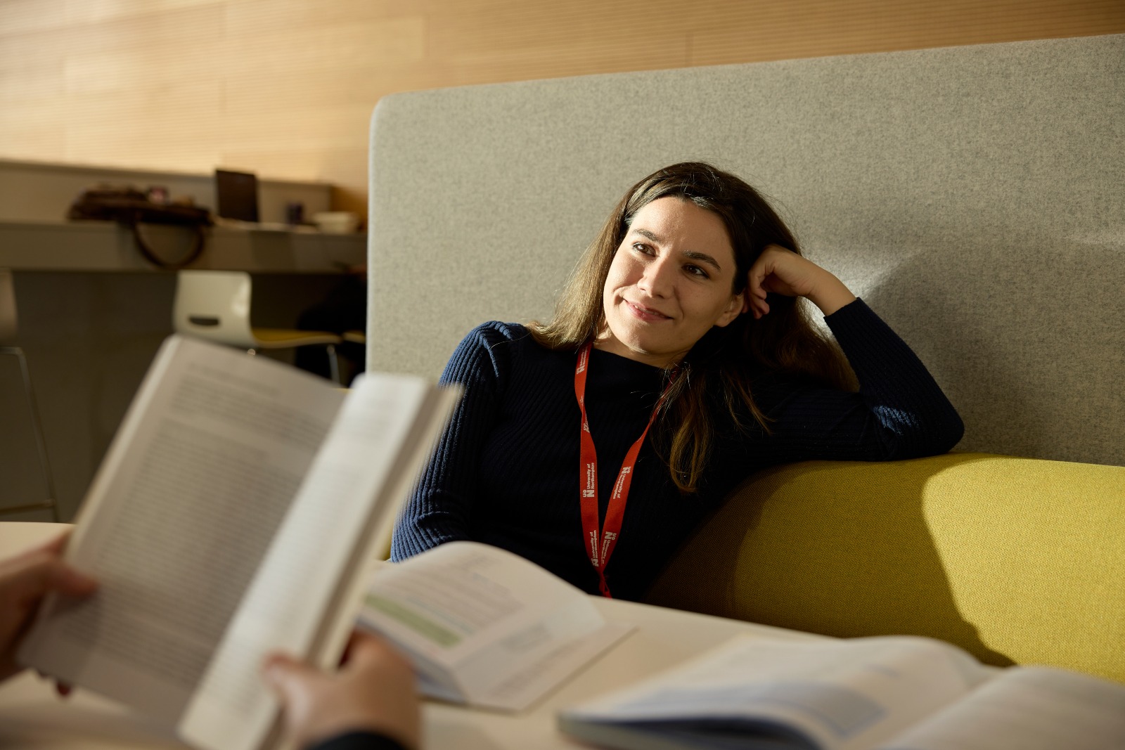 Student relaxing couch.
