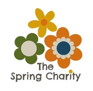 The Spring Charity logo with three flowers in orange, yellow and green.