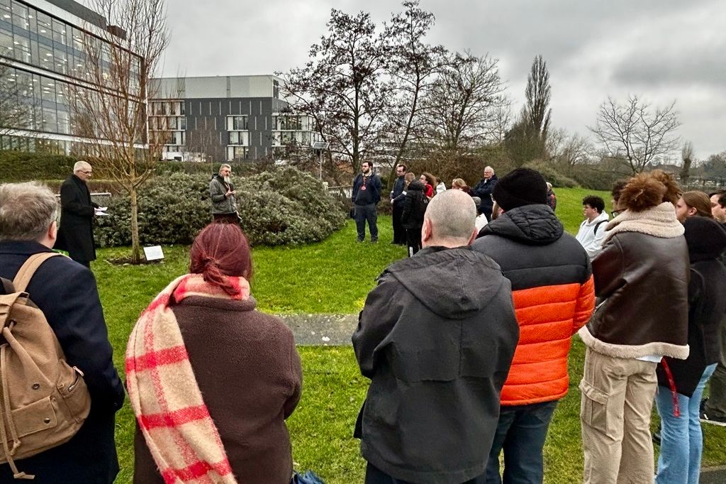 University Chaplain Dr Stuart Mousir Harrison lead the stone laying ceremony at the University Memorial Tree.