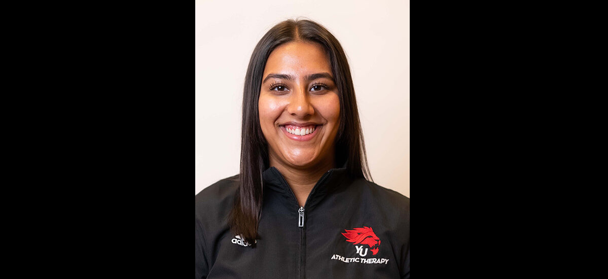 Loveleen Gaidhu, Physiotherapy (pre-registration) MSc graduate. Loveleen is wearing her athletic therapy uniform.