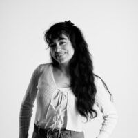 Black and white photo of Emiliana, a psychology PhD student