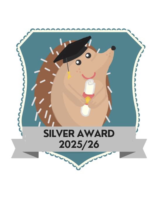 Cartoon Hedgehog wearing a mortarboard and holding a scroll. Underneath it says Silver Award 2025/26