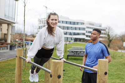 Image by Paul Michael Hughes Photography T 07790819111 UK E pmh@paulmichaelhughes.com W www.paulmichaelhughes.com A student swinging on exercise bar