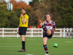 Photo of a female Rugby player taken by Izzy Poles