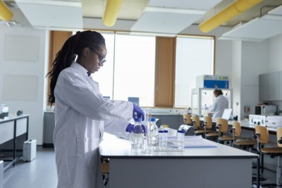 Two students undertaking experiments in the Biomedical Science teaching lab