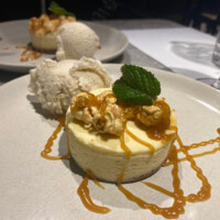 Toffee Popcorn Cheesecake, served with Vanilla Ice Cream