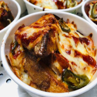 Homemade Potato Wedges, topped with Cheese & Jalapenos