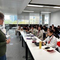 The first group of academics from China who visited UON as part of a new cultural and education exchange partnership learn about Creating Aligned Interactive Educational Resource Opportunities (CAIeRO) with Learning Designer Nicola Denning.