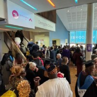 Crowd of graduates, guests and staff are pictured in the foyer of Royal & Derngate ahead of one of the Spring 2025 Graduation Ceremonies.