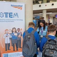 a member of Network Rail talks to a STEAM Northants guest.