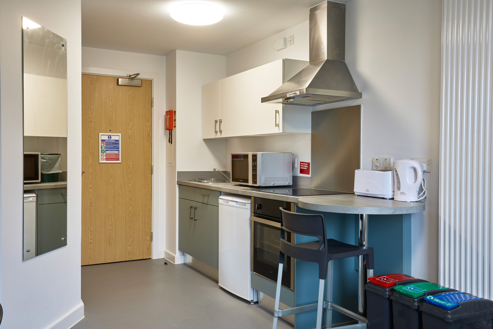 Open plan kitchen area in studio flat at Waterside