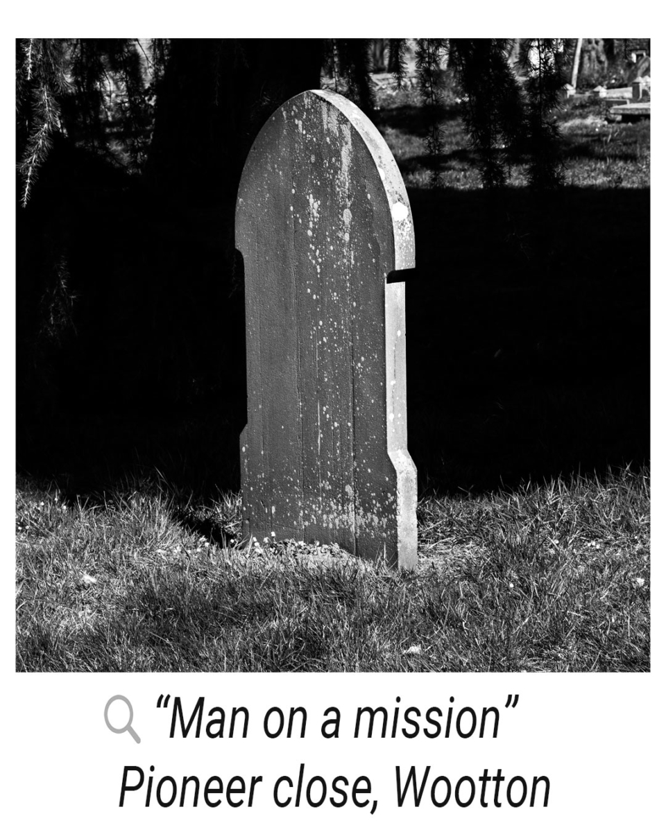 An unmarked gravestone in a cemetery with a quote alongside it “man on a mission”, Pioneer close