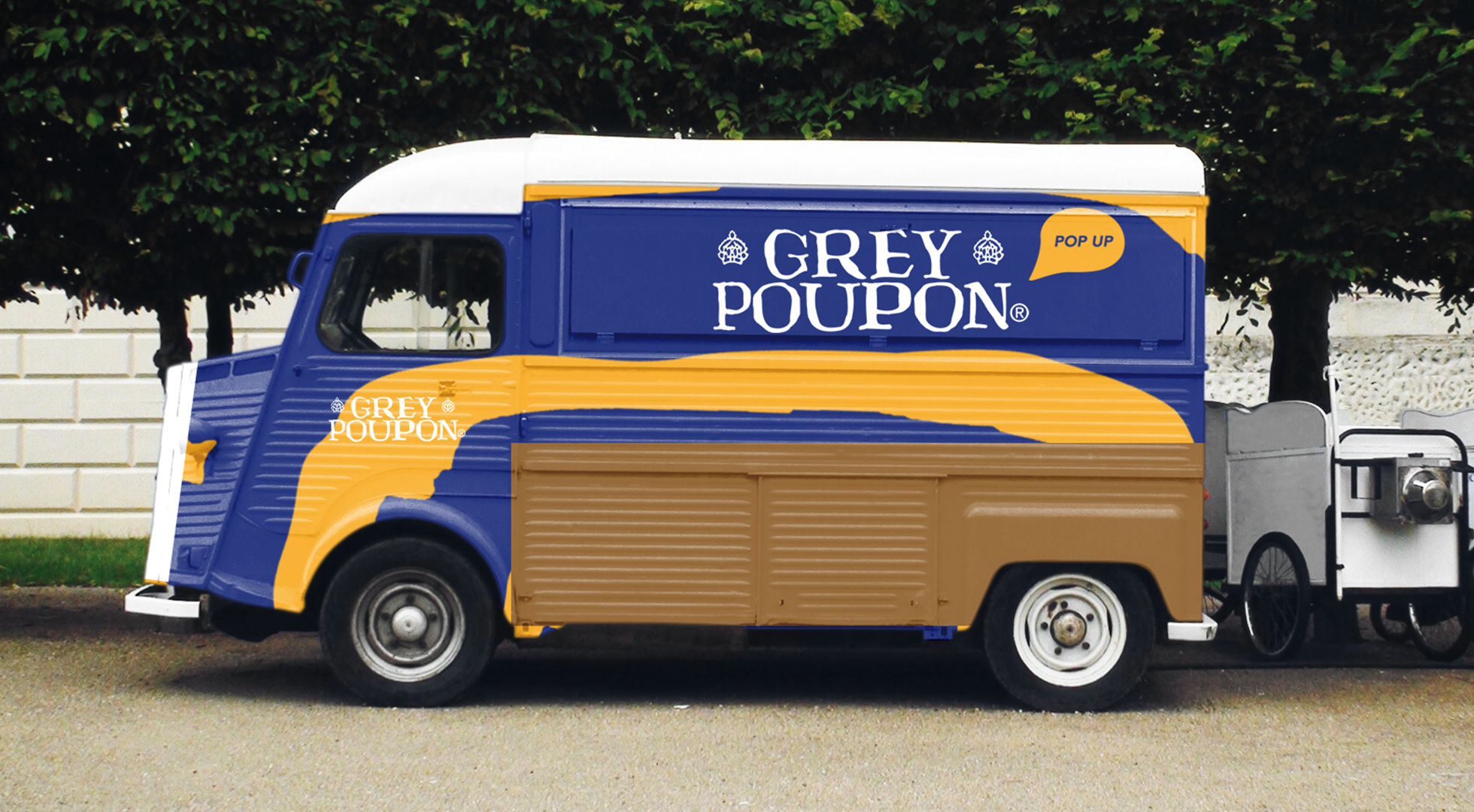 The Grey Poupon food truck covered with illustrations 