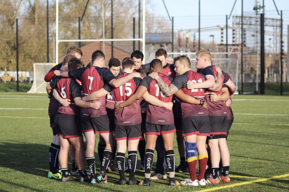 UON rugby society in a huddle