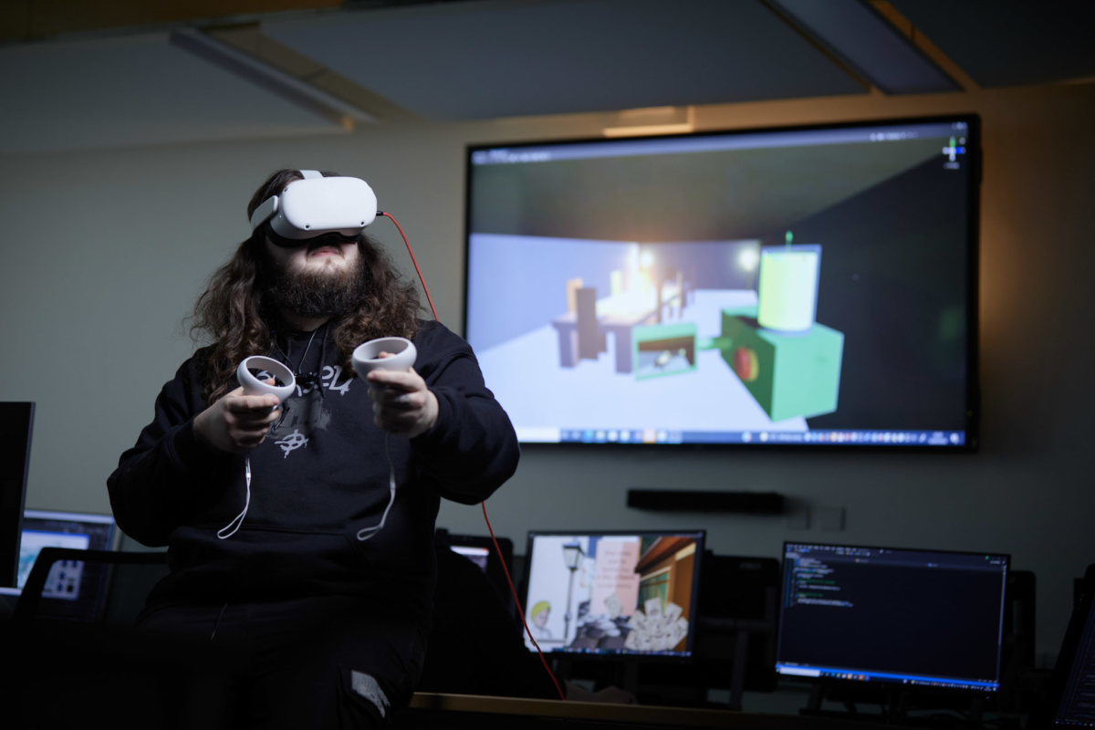 Student wearing a Virtual Reality headset